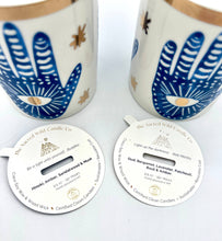 Load image into Gallery viewer, Beautiful Gold & Blue White Ceramic Hamsa Scented Candle: Hinoki & Sandalwood