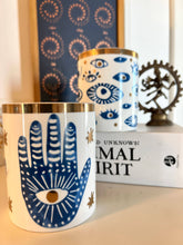 Load image into Gallery viewer, Beautiful Gold & Blue White Ceramic Hamsa Scented Candle: Hinoki & Sandalwood