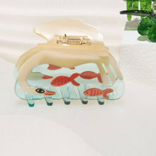 Load image into Gallery viewer, Women&#39;s White Swan Hair Claw in Crystal Clear Blue Acetate

